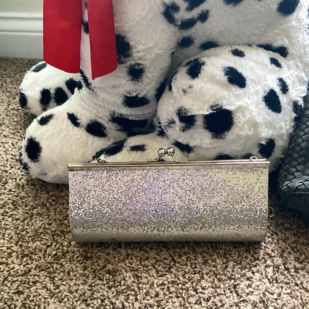 Never worn, silver, glittery, clutch with detachable strap